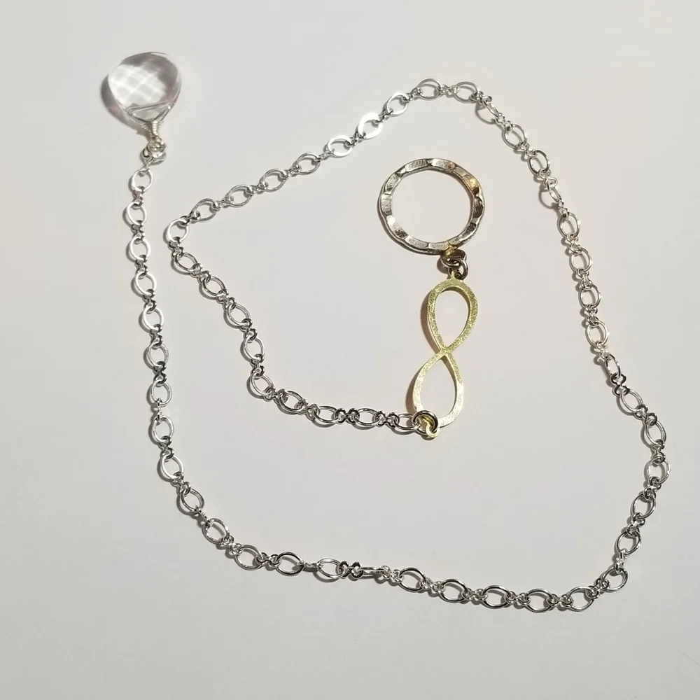 Infinity symbol necklace thread through clear briolette silver gold tone